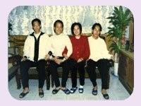 Mr. Chen, his wife and two sons.