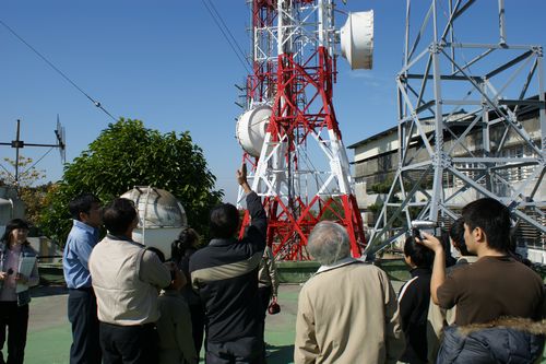 I Like Radio and I Radio FM antenna (the building on the right is the Wun De Elementary School complex)