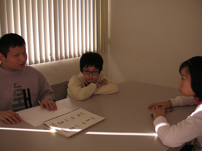 A beam of light happened to came in through a window while Mr. Chun-Hung was explaining to us about the Braille system.