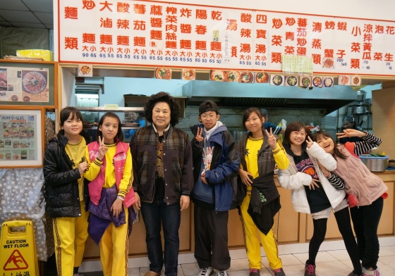 Picture with Granny Li of the South Village Café 